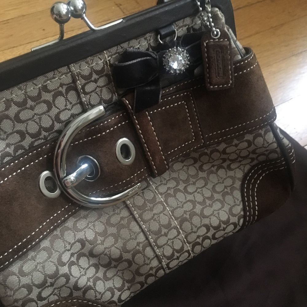 Brown Signature Coach soho Frame purse